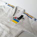 Кимоно для дзюдо Adidas Champion 2 с аккредитацией IJF национальный флаг (J-IJF-SMU, белое)